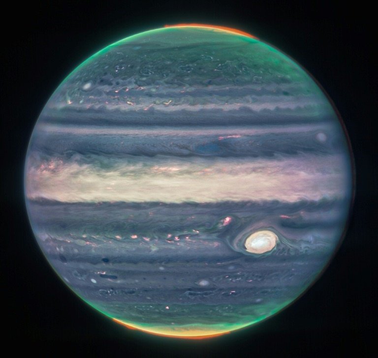 This image obtained from NASA taken by the James Webb Space Telescope shows Jupiter's weather patterns, tiny moons, altitude levels, cloud covers and auroras at the northern and southern poles. Photo: NASA/AFP
