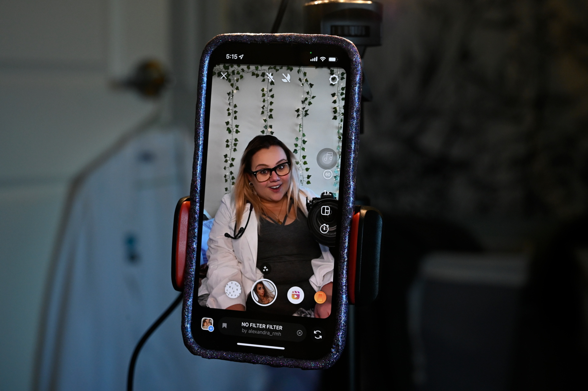Spencer prepares to record a video for her Instagram account, at her apartment in Syracuse, New York, May 8, 2022. Photo: Reuters