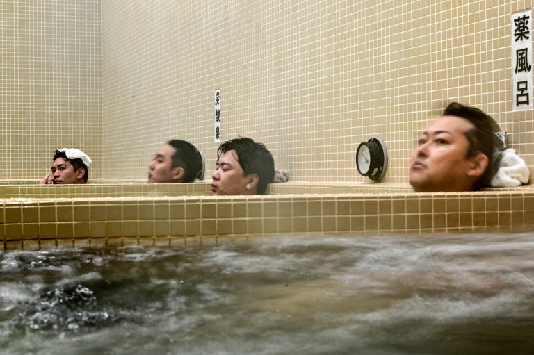 Bathers pay 500 yen ($3.70) to enter the men's or women's bath, a fee set by the Tokyo government. Photo: AFP