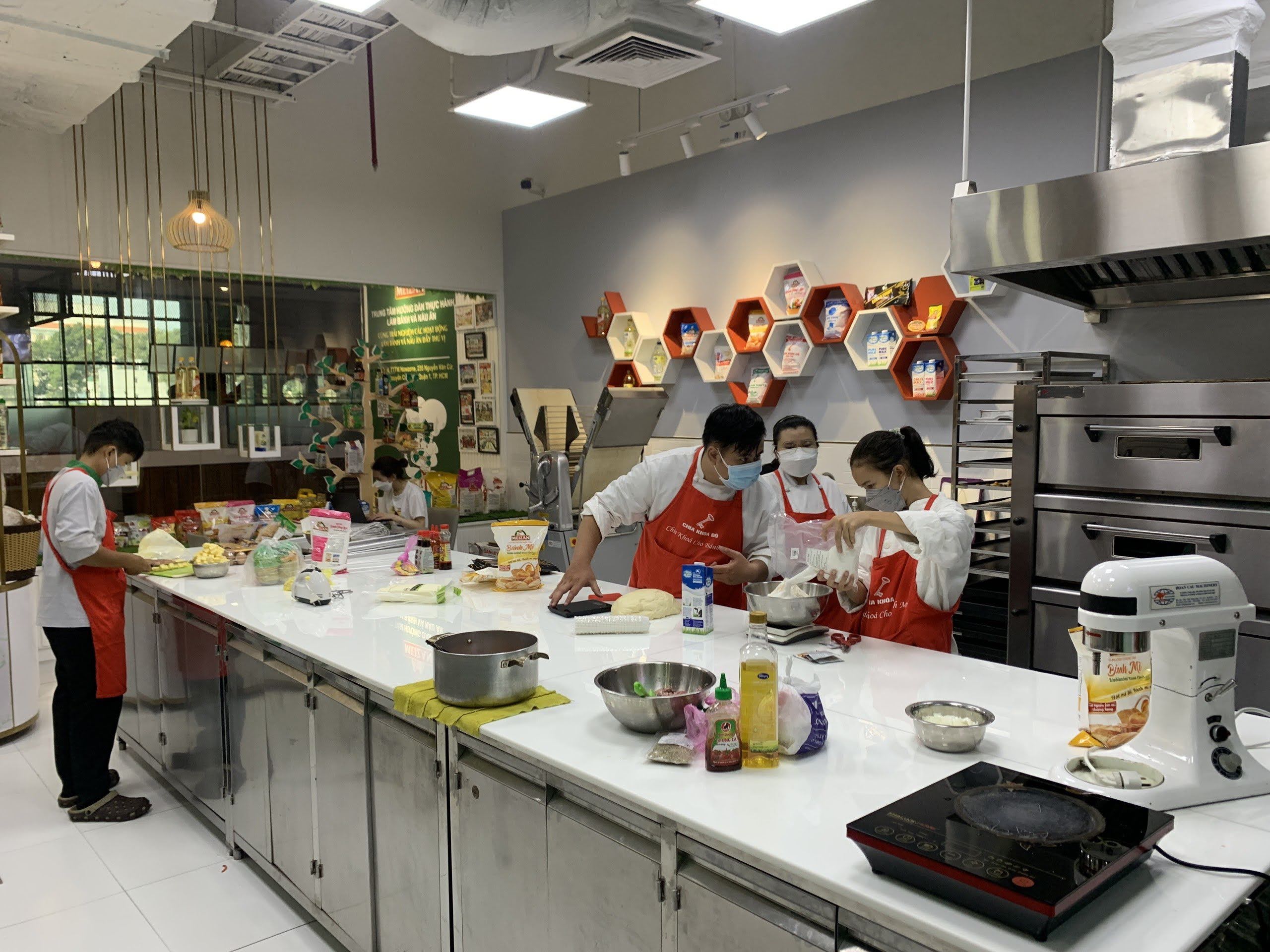 A supplied photo shows trainees are instructed during the 2021 ‘Cho Di La Con Mai – Kien Tao Tuong Lai’ program held by the World Association of Master Chefs - Vietnam Chapter.
