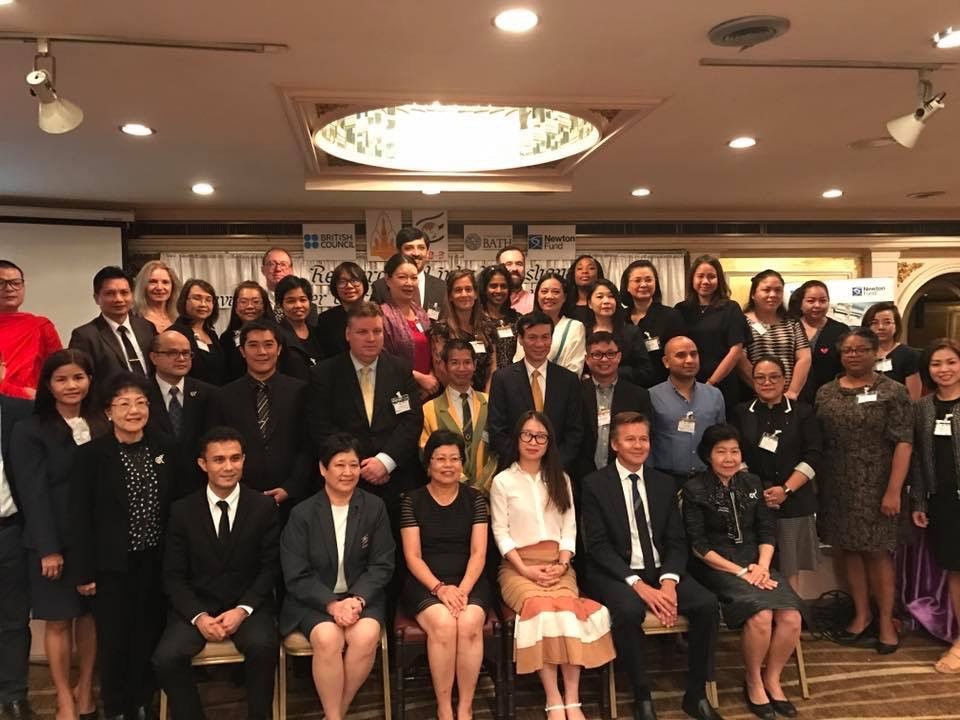 Minh Hong (seated in the center) next to a Thai colleague at an event she helped organize in 2017 at a workshop in Bangkok for young researchers from the United Kingdom and Thailand, in a provided photo.