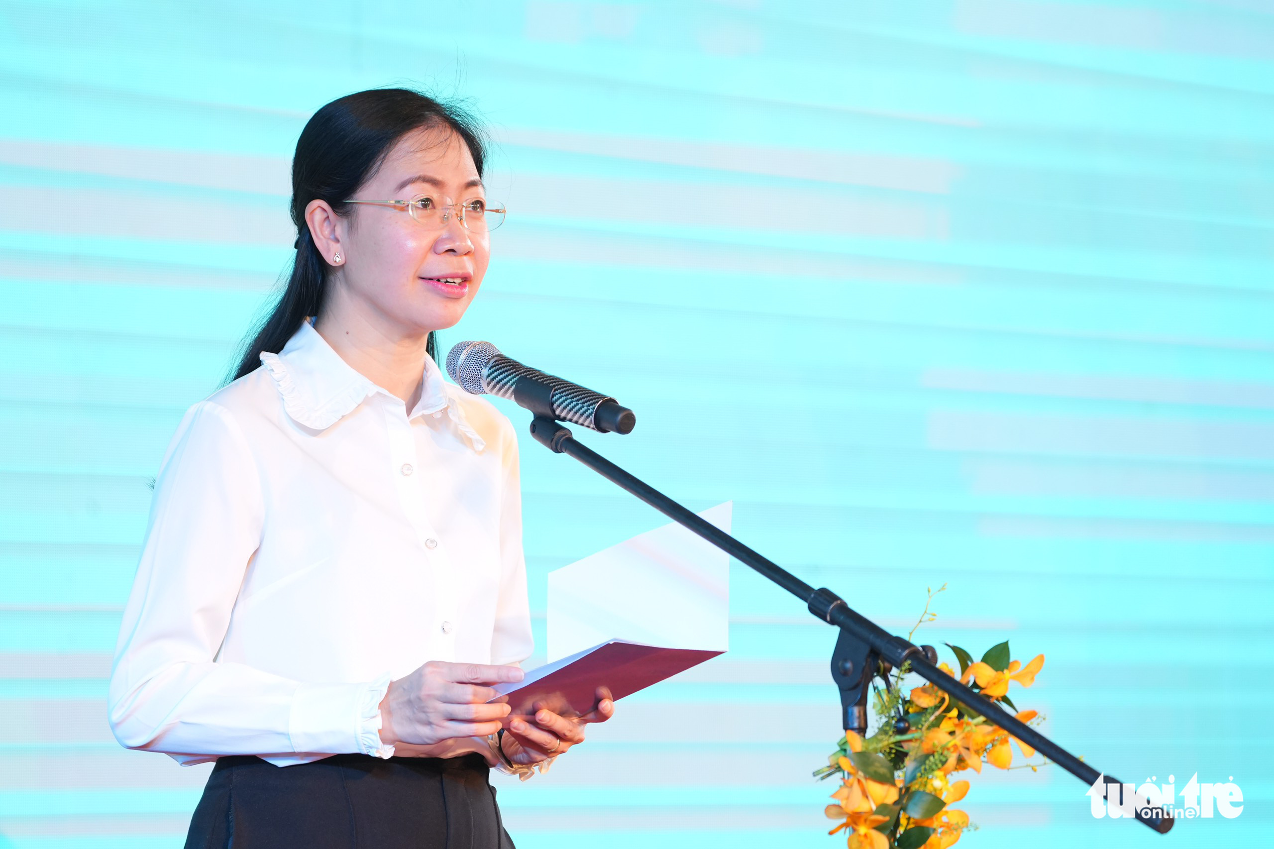 Secretary of Ho Chi Minh City Youth Union Phan Thi Thanh Phuong speaks at the groundbreaking of the Tuoi Tre Complex in Go Vap District, Ho Chi Minh City, August 30, 2022. Photo: Huu Hanh / Tuoi Tre
