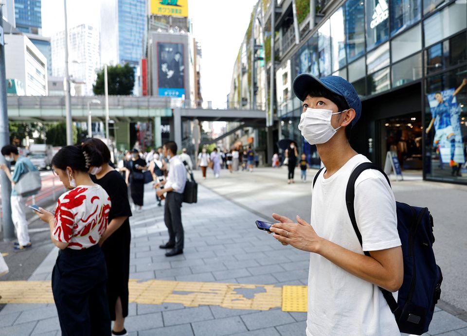 Shoji Morimoto who charges 10,000 yen ($71.30) an hour to accompany clients and simply exist as a companion, makes his way to meet his client in Tokyo, Japan August 31, 2022. Photo: Reuters