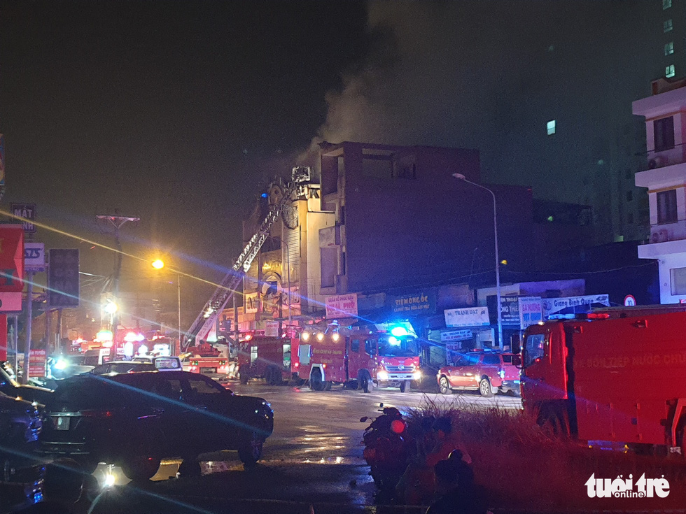 Fire trucks are seen at the scene of a fire at a karaoke venue in Thuan An City, Binh Duong Province, Vietnam, September 6, 2022. Photo: T. Hai / Tuoi Tre
