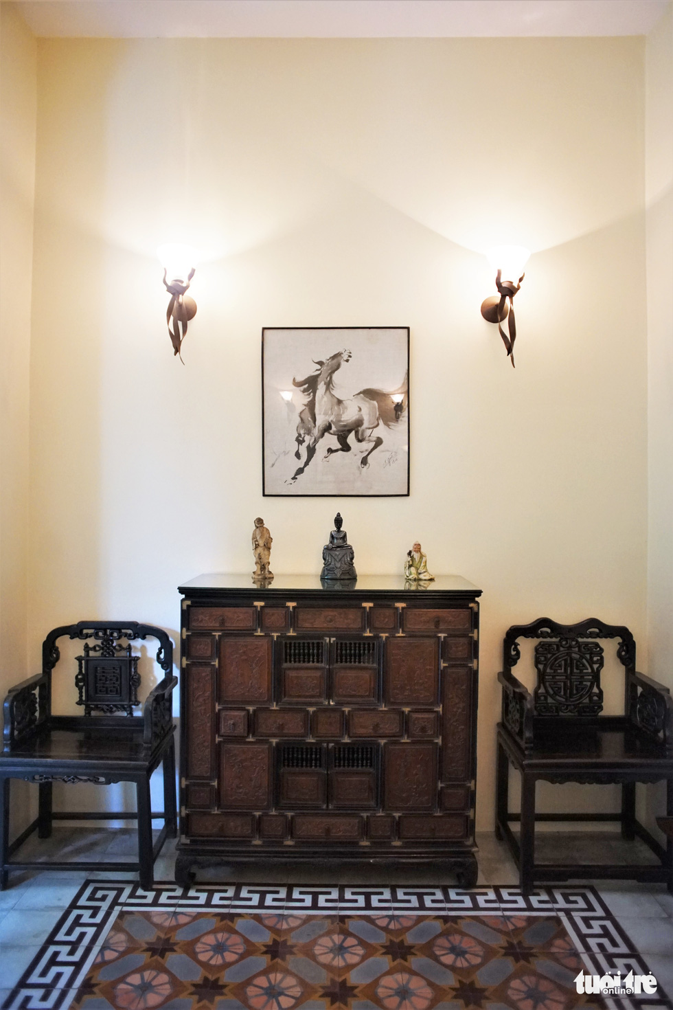 The small living room with original cement floor tiles from 1872 in the Consulate General of France in Ho Chi Minh City. Photo: Huynh Vy / Tuoi Tre