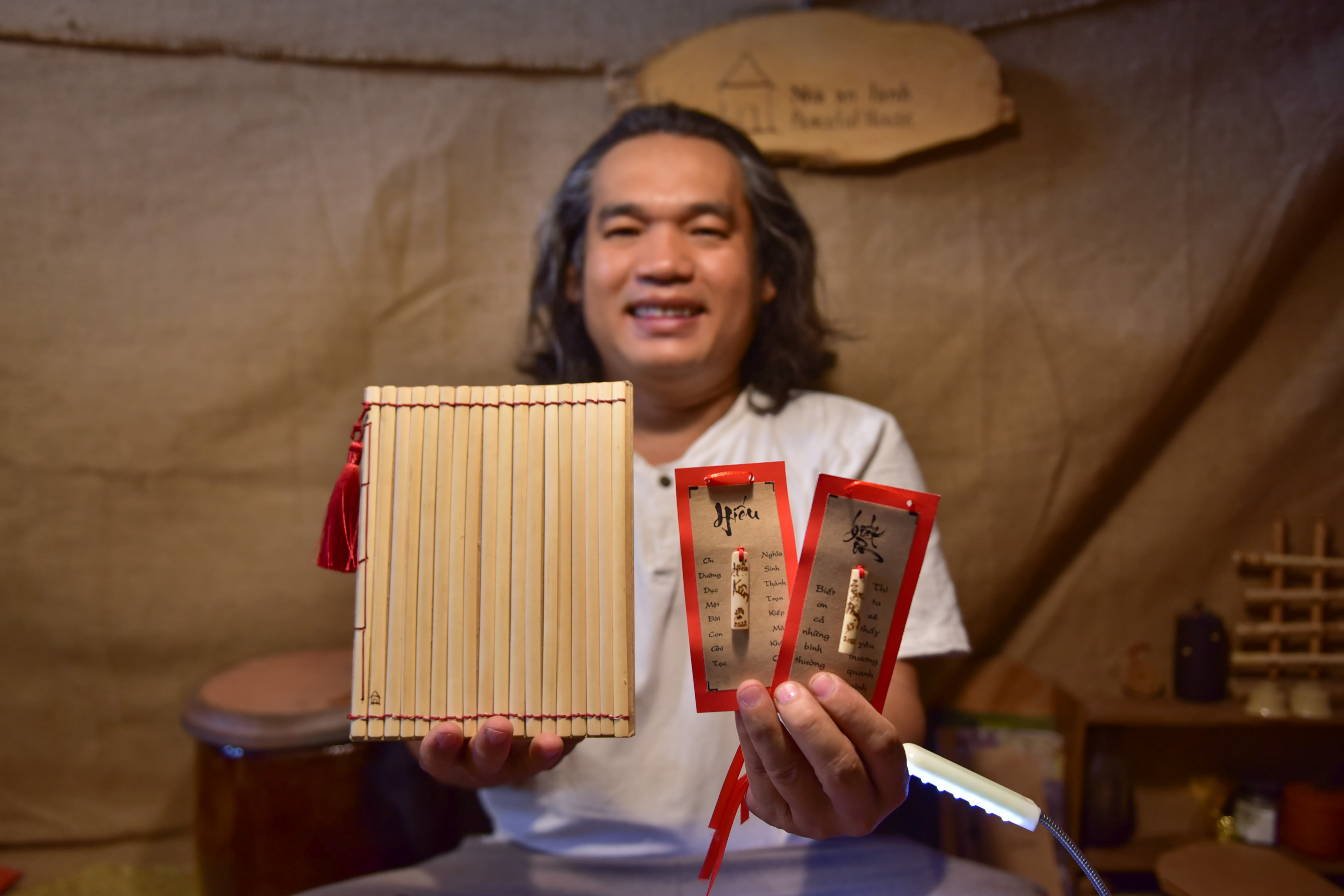 Bamboo books and lucky bamboo sticks. Photo:  Ngoc Phuong / Tuoi Tre News