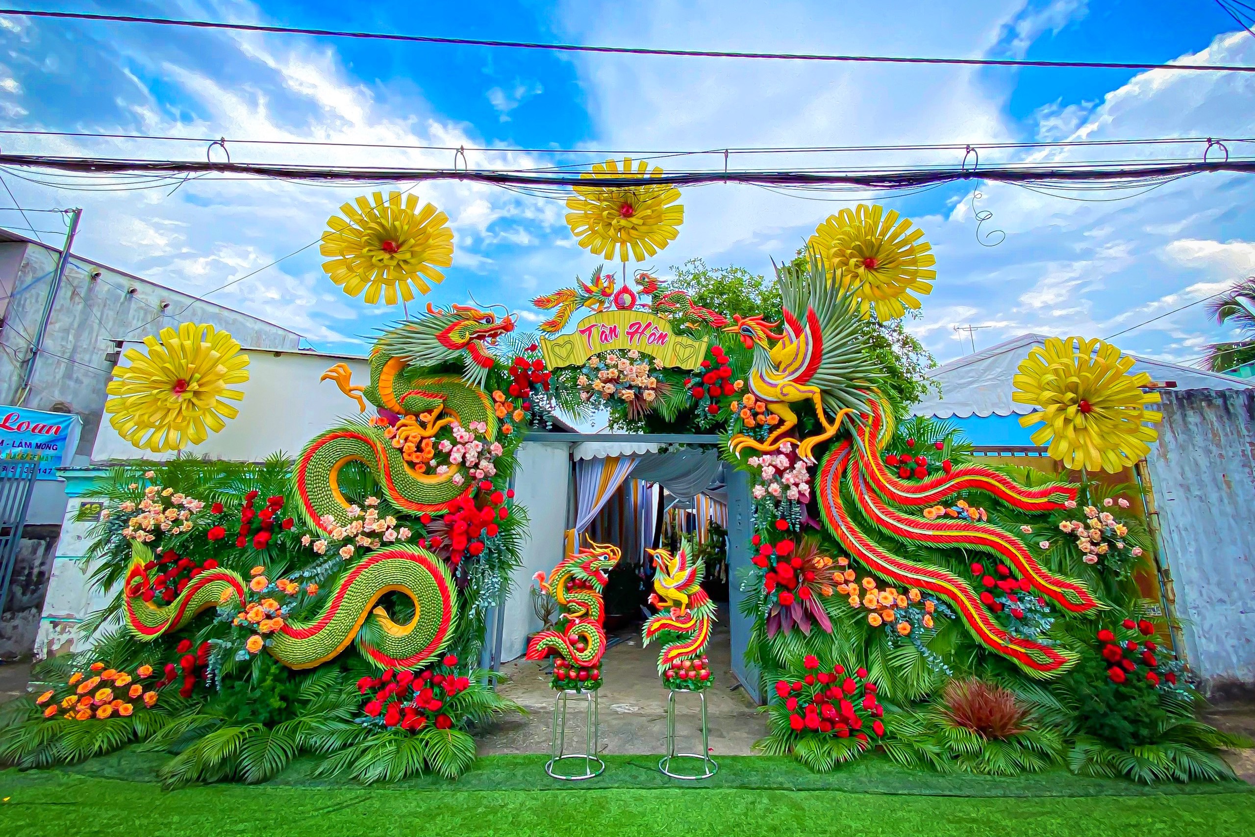 In southern Vietnam, couples favor massive wedding gates made from veggies