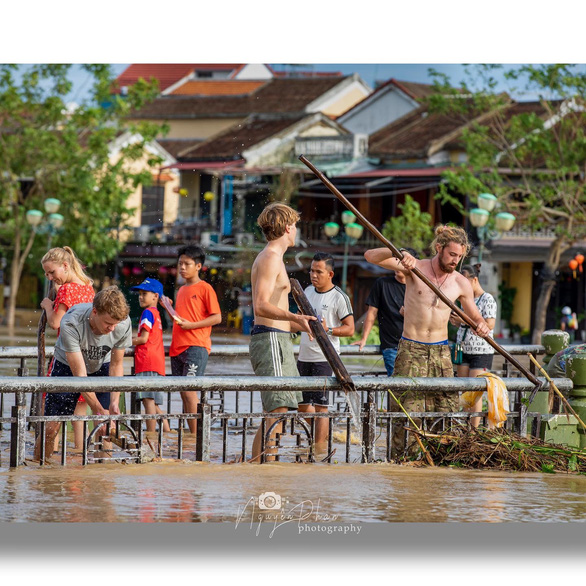 International visitors join hands to clean up Hoi An following Typhoon Noru