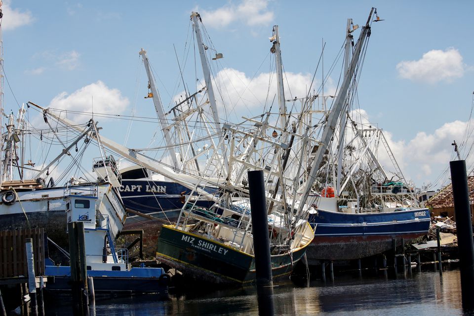 Stranded shrimp boats are seen in the Matanzas Pass after Hurricane Ian caused widespread destruction in Fort Myers Beach, Florida, U.S., October 1, 2022. Photo: Reuters