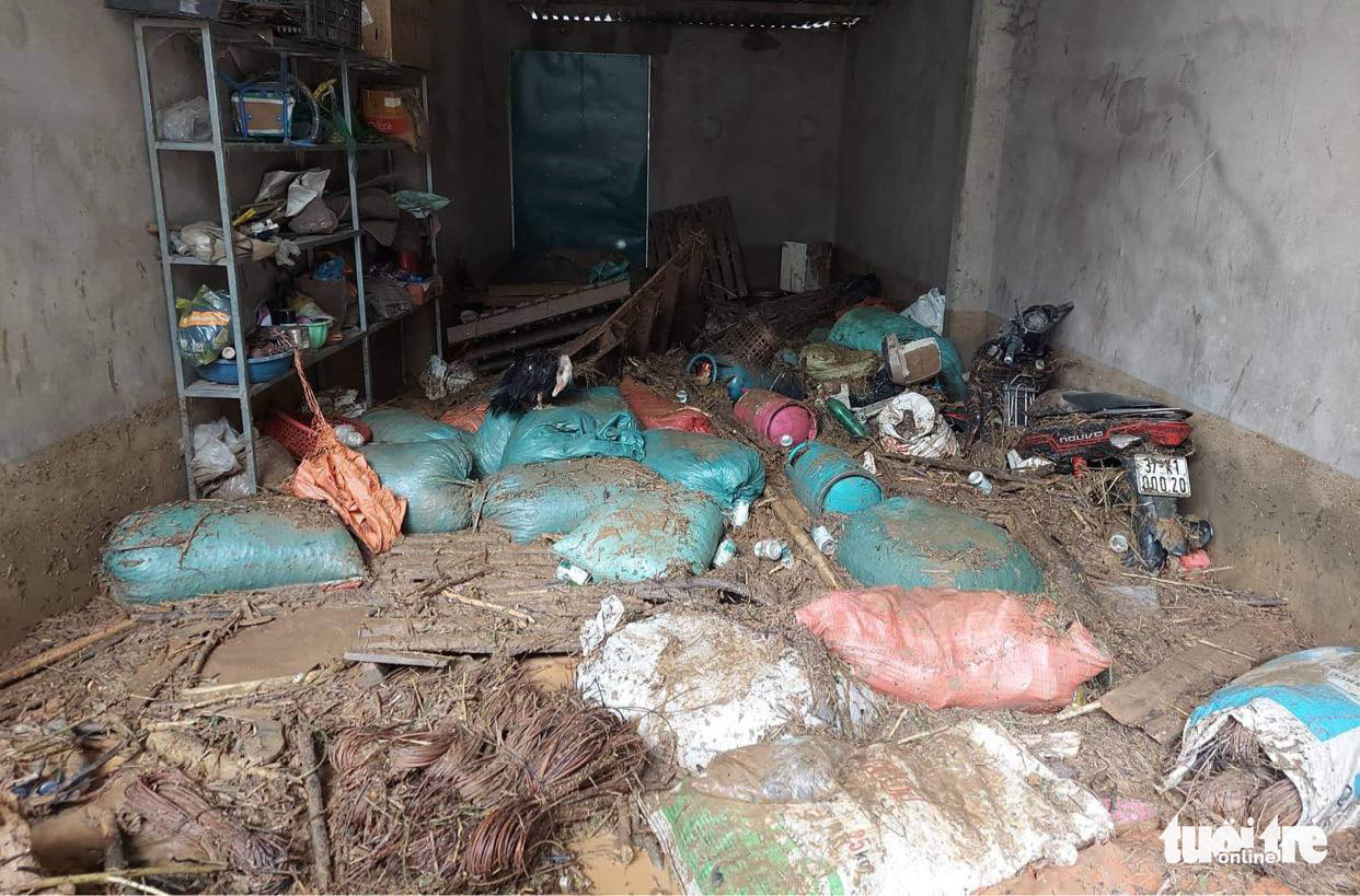 Debris spills into a house following a flash flood in Ky Son District, Nghe An Province, Vietnam, October 2, 2022. Photo: N. Thang / Tuoi Tre