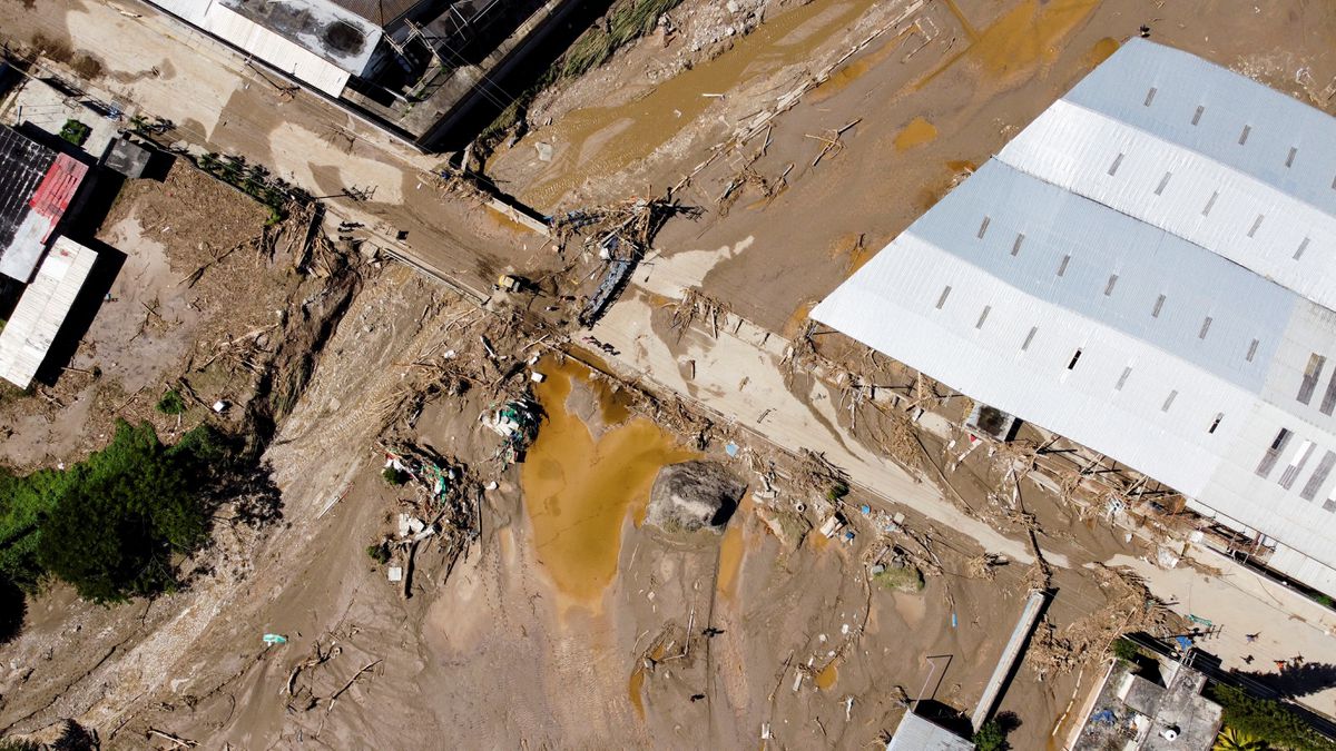 Aerial view of damage in Las Tejerias, which was hit by devastating floods following heavy rain, in Aragua state, Venezuela October 10, 2022. REUTERS/Leonardo Fernandez Viloria