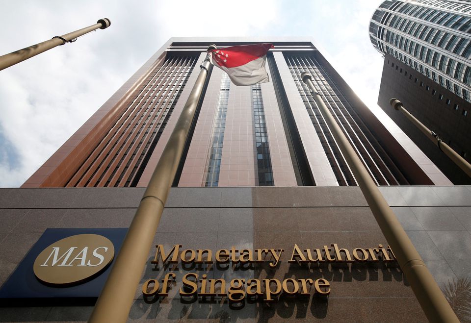 Singapore tightens policy, door open for more action amid risks to outlook