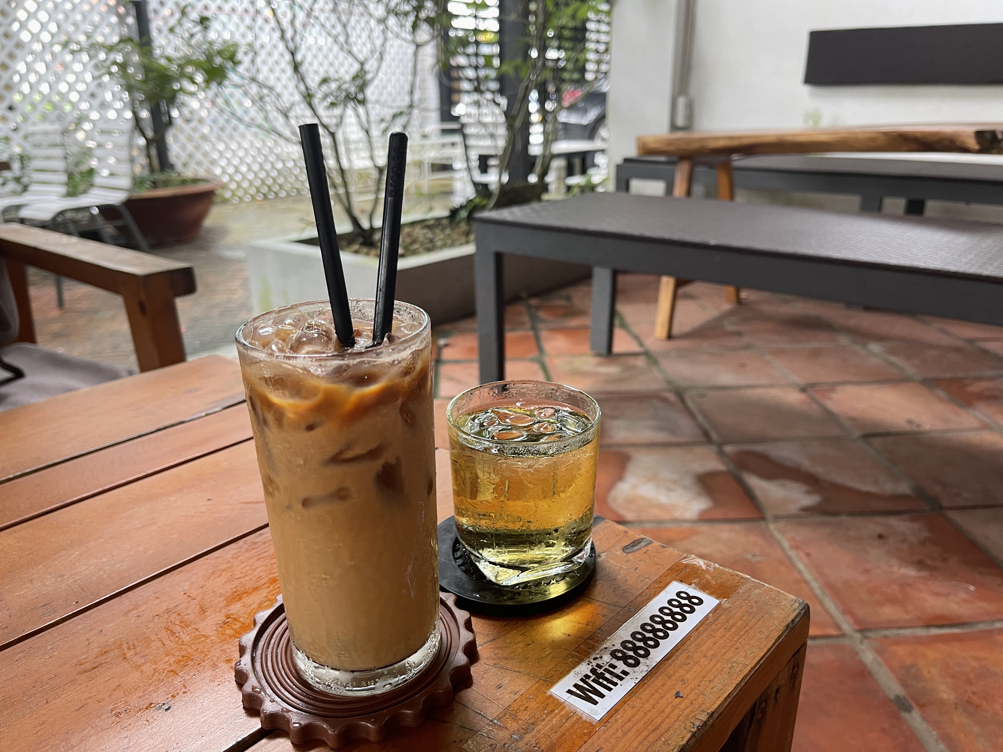‘Cà phê sữa đá’ is served with free iced tea and Wifi at a local coffee shop in Phu Quoc, Vietnam. Photo: Dong Nguyen / Tuoi Tre News