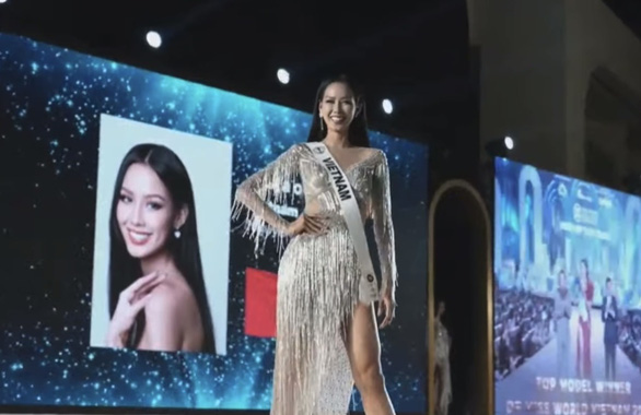 Vietnamese contestant Le Nguyen Bao Ngoc is seen in her evening gown performance in this screenshot.