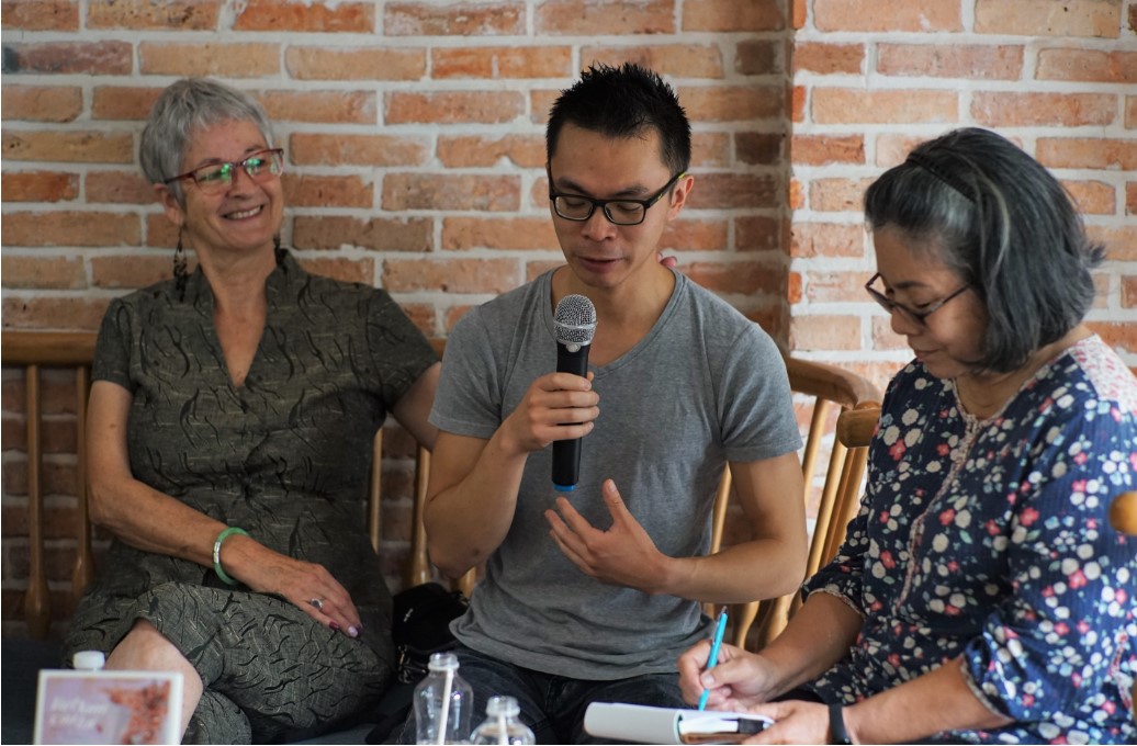 Rémi-Vinh, the adopted son of author Claude Coudert, shared his thoughts at the book launch on October 15 at Nha Nam Book N'Coffee in HCMC. Photo: Huynh Vy / Tuoi Tre