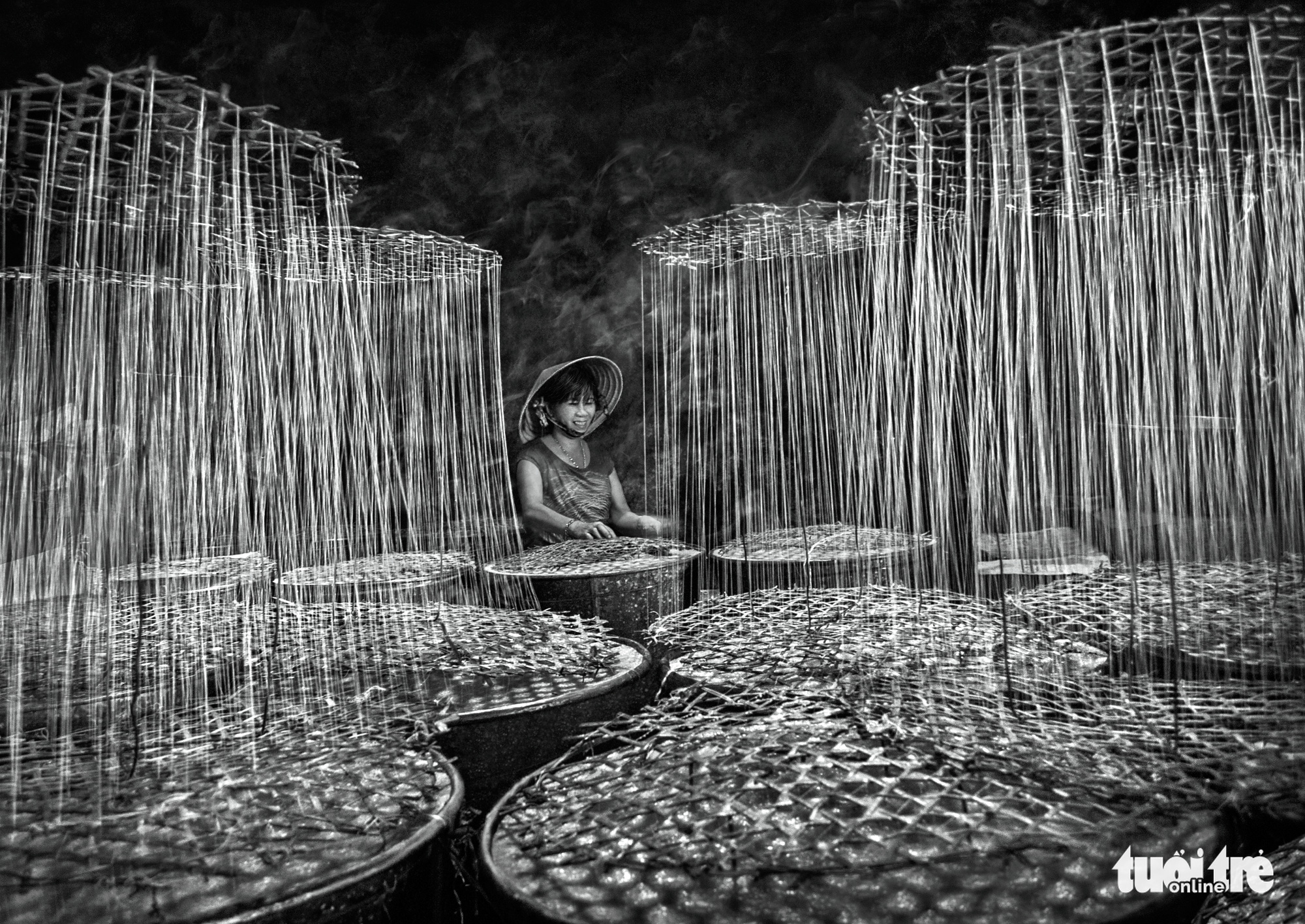 A woman makes rock sugar at a facility in Quang Ngai Province, Vietnam. Photo: Dao Tien Dat