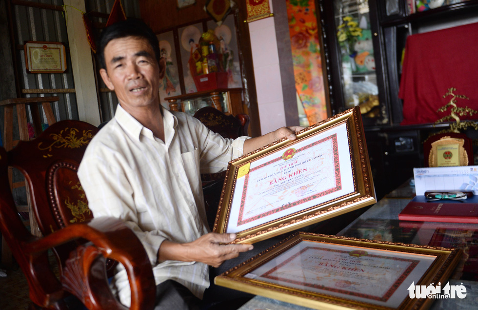 Nguyen Van Doi proudly shares certificates of merit from the Ho Chi Minh City People’s Committee