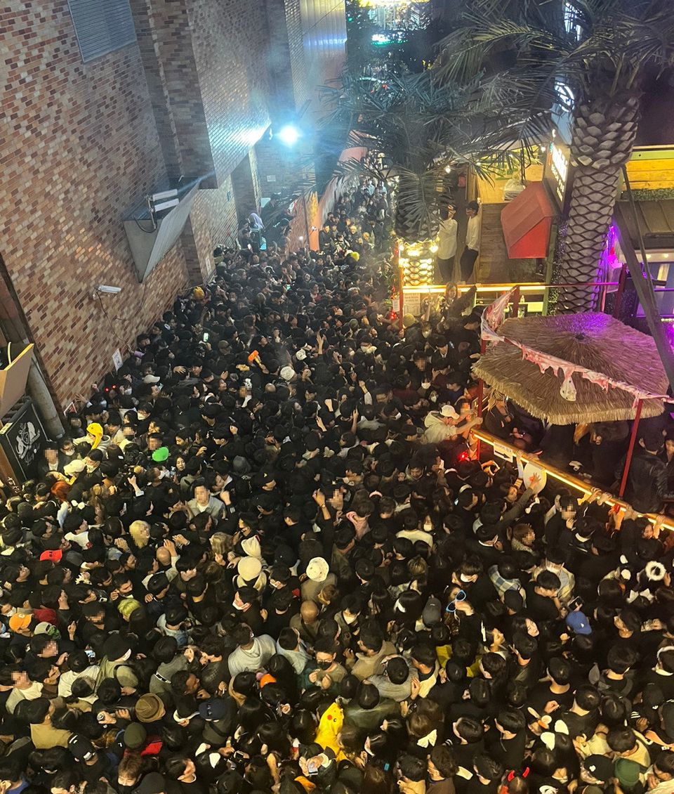 A street in Itaewon district is pictured full of people before a stampede during Halloween festivities killed and injured many in Seoul, South Korea, in this image released by Yonhap on October 30, 2022. Photo: Yonhap via Reuters