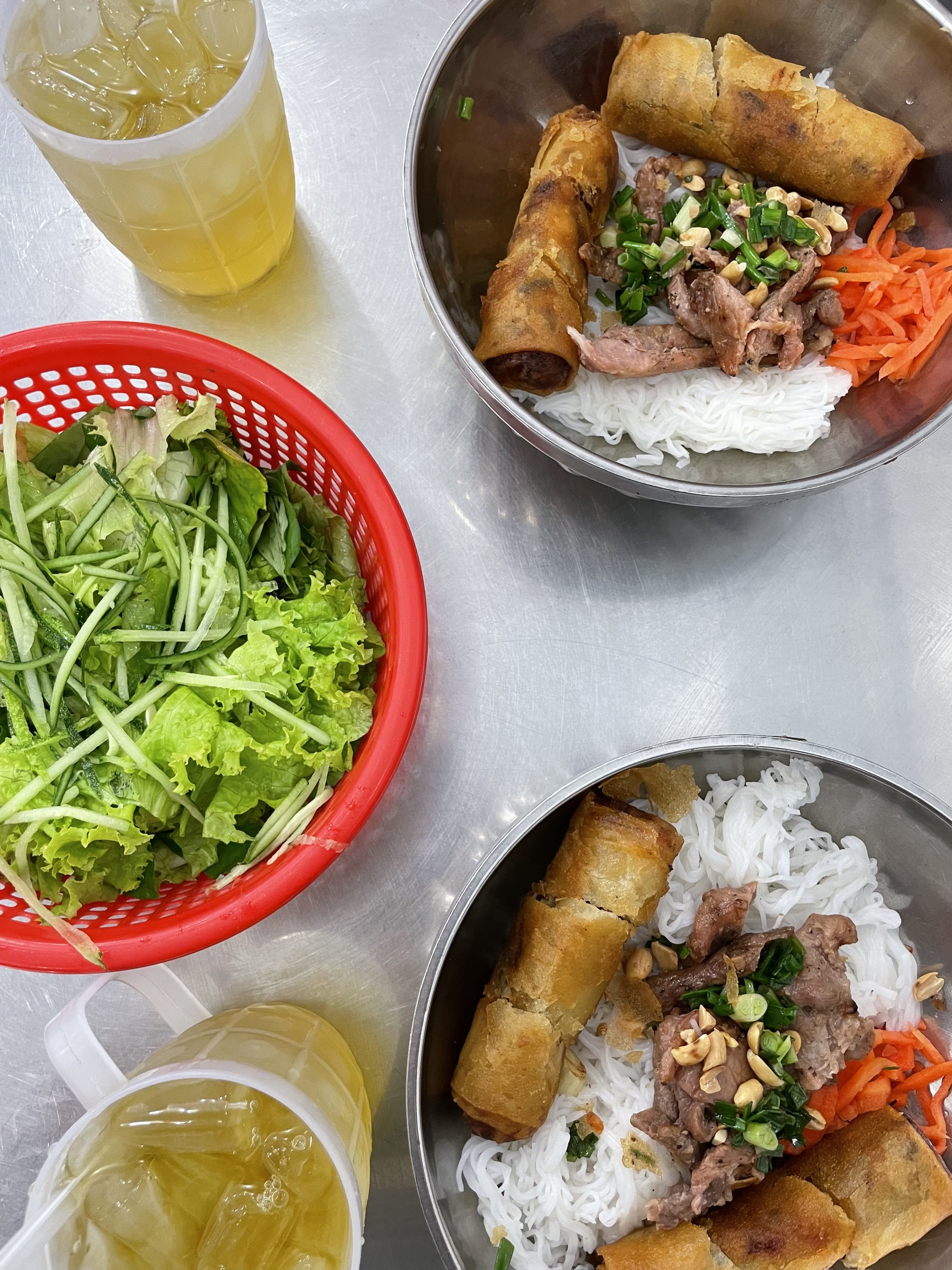Two bowls of 'bún thịt nướng' served at Kieu Bao, a 'bún thịt nướng' restaurant with six branches across Ho Chi Minh City. Photo: Cassanda Cassidy / Tuoi Tre News