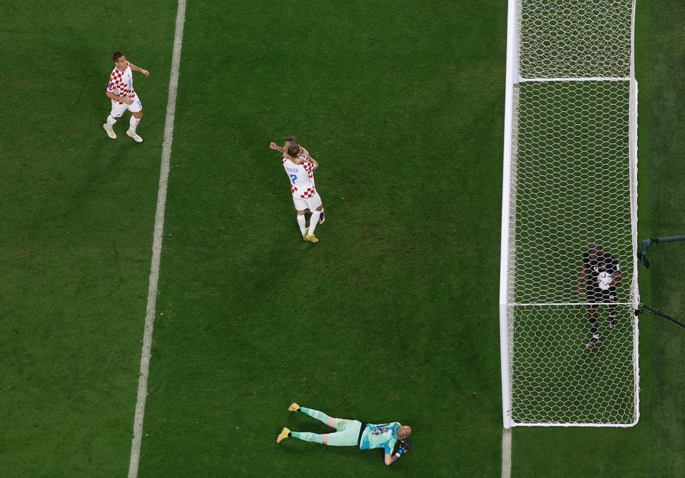 Soccer Football - FIFA World Cup Qatar 2022 - Group F - Croatia v Canada - Khalifa International Stadium, Doha, Qatar - November 27, 2022 Croatia's Lovro Majer celebrates scoring their fourth goal with Mislav Orsic. Photo: Reuters