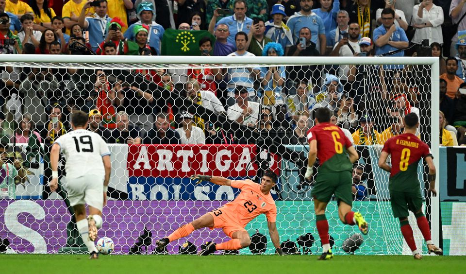 Soccer Football - FIFA World Cup Qatar 2022 - Group H - Portugal v Uruguay - Lusail Stadium, Lusail, Qatar - November 28, 2022 Portugal's Bruno Fernandes scores their second goal from the penalty spot. Photo: Reuters