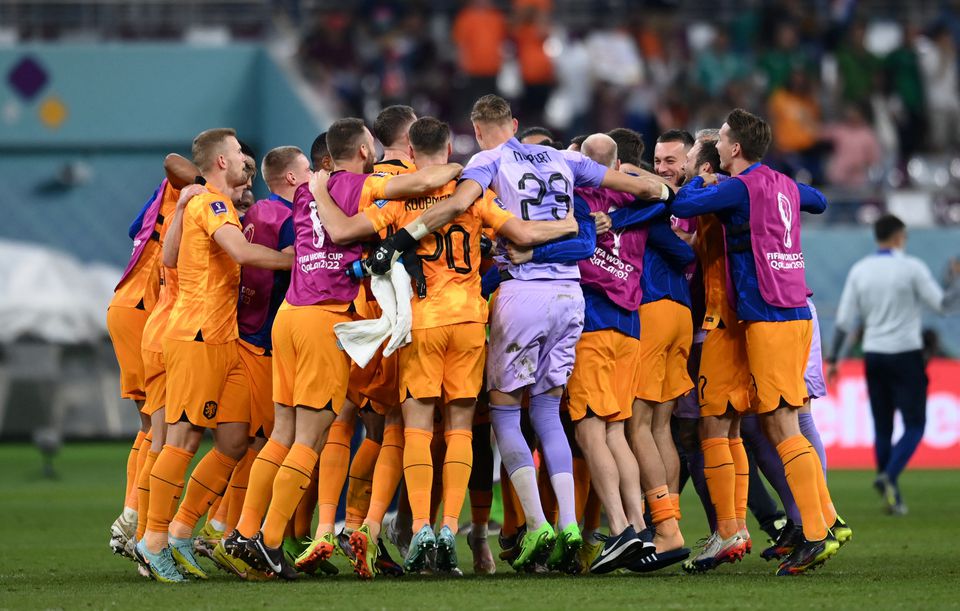Soccer Football - FIFA World Cup Qatar 2022 - Round of 16 - Netherlands v United States - Khalifa International Stadium, Doha, Qatar - December 3, 2022 Netherlands players celebrate after the match as they progress to the quarter finals. Photo: Reuters