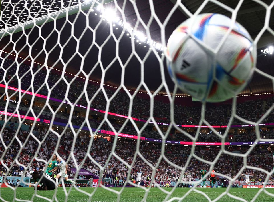 Soccer Football - FIFA World Cup Qatar 2022 - Round of 16 - England v Senegal - Al Bayt Stadium, Al Khor, Qatar - December 4, 2022 England's Harry Kane scores their second goal. Photo: Reuters