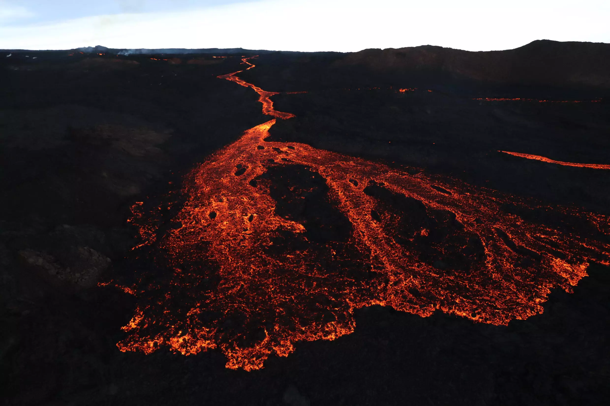 Rivers of molten rock are issuing from Mauna Loa, the world's largest active volcano. Photo: Handout / US Geological Survey/AFP