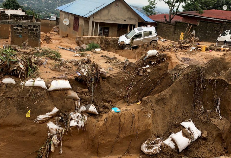 A car is seen after heavy rains caused floods and landslides, on the outskirts of Kinshasa, Democratic Republic of Congo December 13, 2022. Photo: Reuters