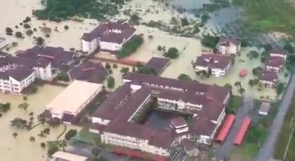 An aerial view shows a flooded neighbourhood in east-coast of peninsular Malaysia, Malaysia, December 19, 2022, in this still image obtained from a social media video. Facebook/Korporat JBPM/via REUTERS