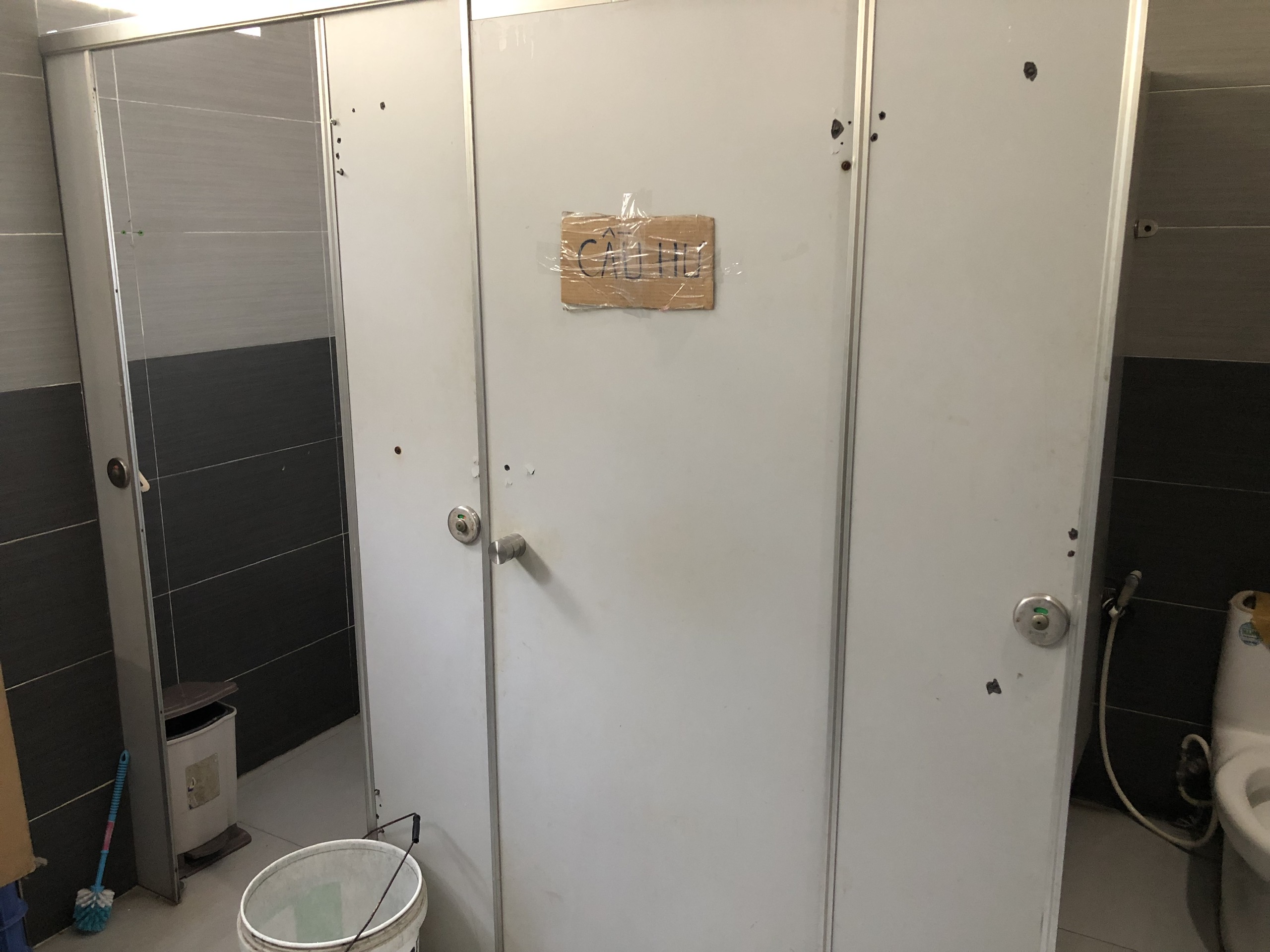 A malfunctioning toilet stall is closed at the Saigon Railway Station in Ho Chi Minh City. Photo: Luu Duyen / Tuoi Tre