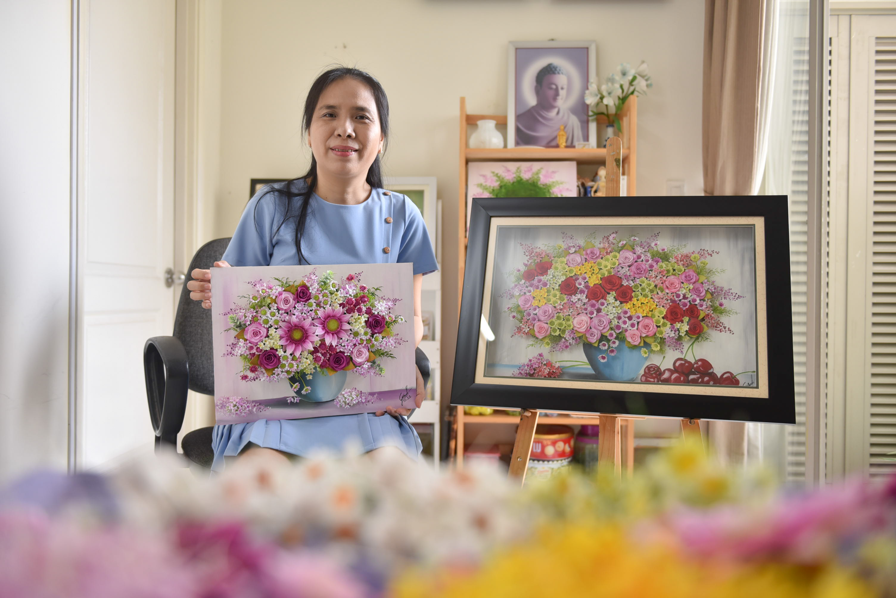 Vietnamese women makes floral art pieces from clay and oil paint