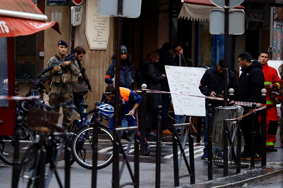 French police secure a street after gunshots were fired killing two people and injuring several in a central district of Paris, France, December 23, 2022. REUTERS/Sarah Meyssonnier