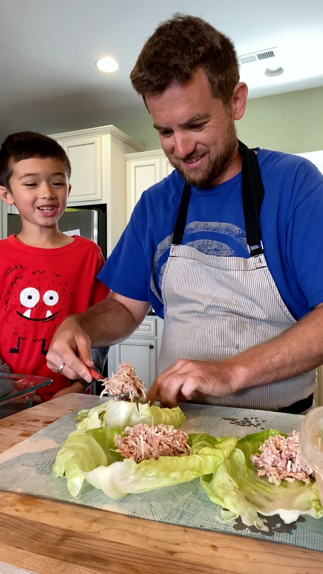A supplied photo shows Chad Richard Kubanoff and his son are cooking at home.