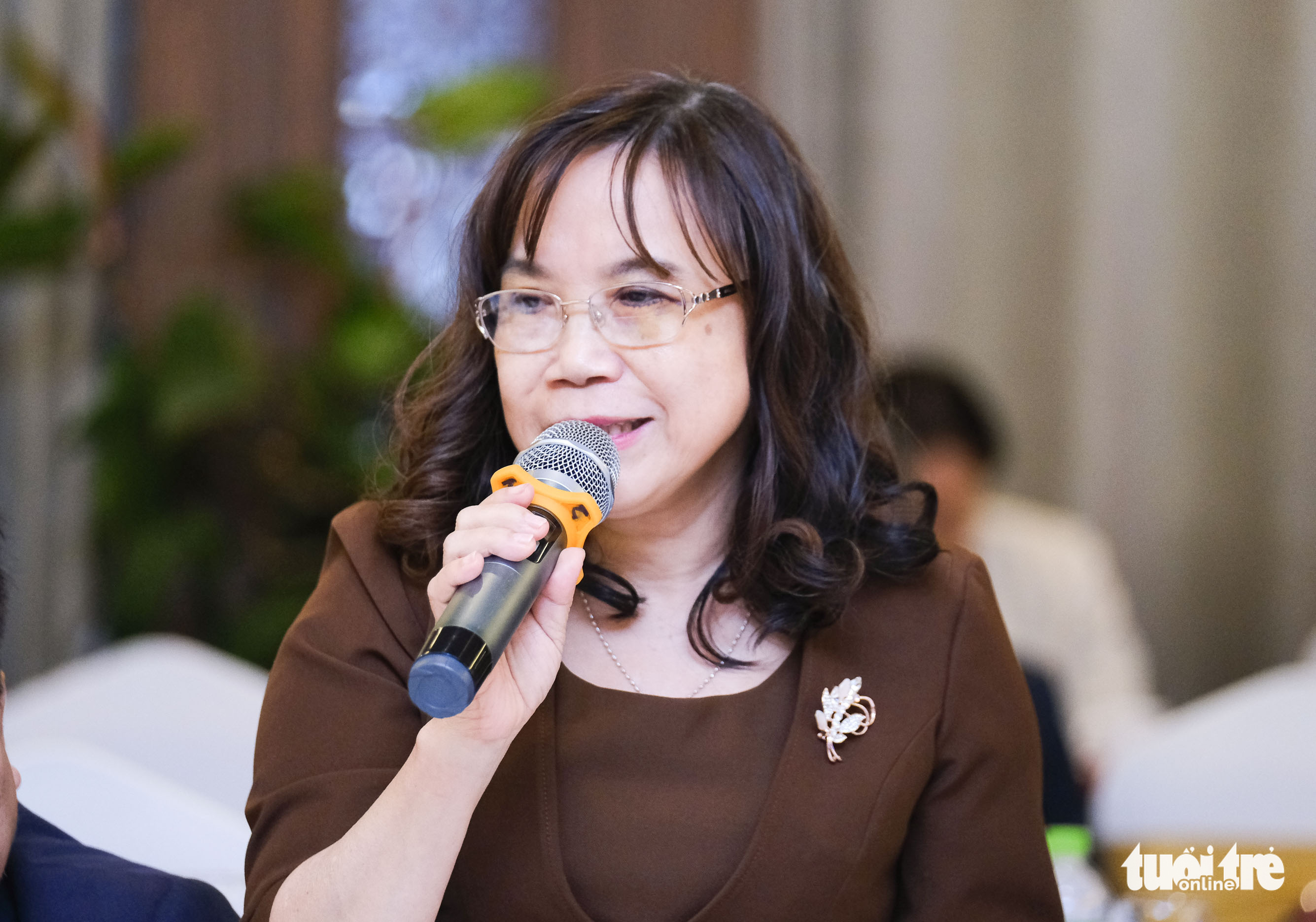 Nguyen Thi Thuy Mai, deputy director of the Da Nang Department of Industry and Trade, speaks at the seminar. Photo: Tan Luc / Tuoi Tre