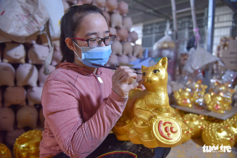 Visiting Lai Thieu in southern Vietnam to see yellow kitty banks for Year of Cat