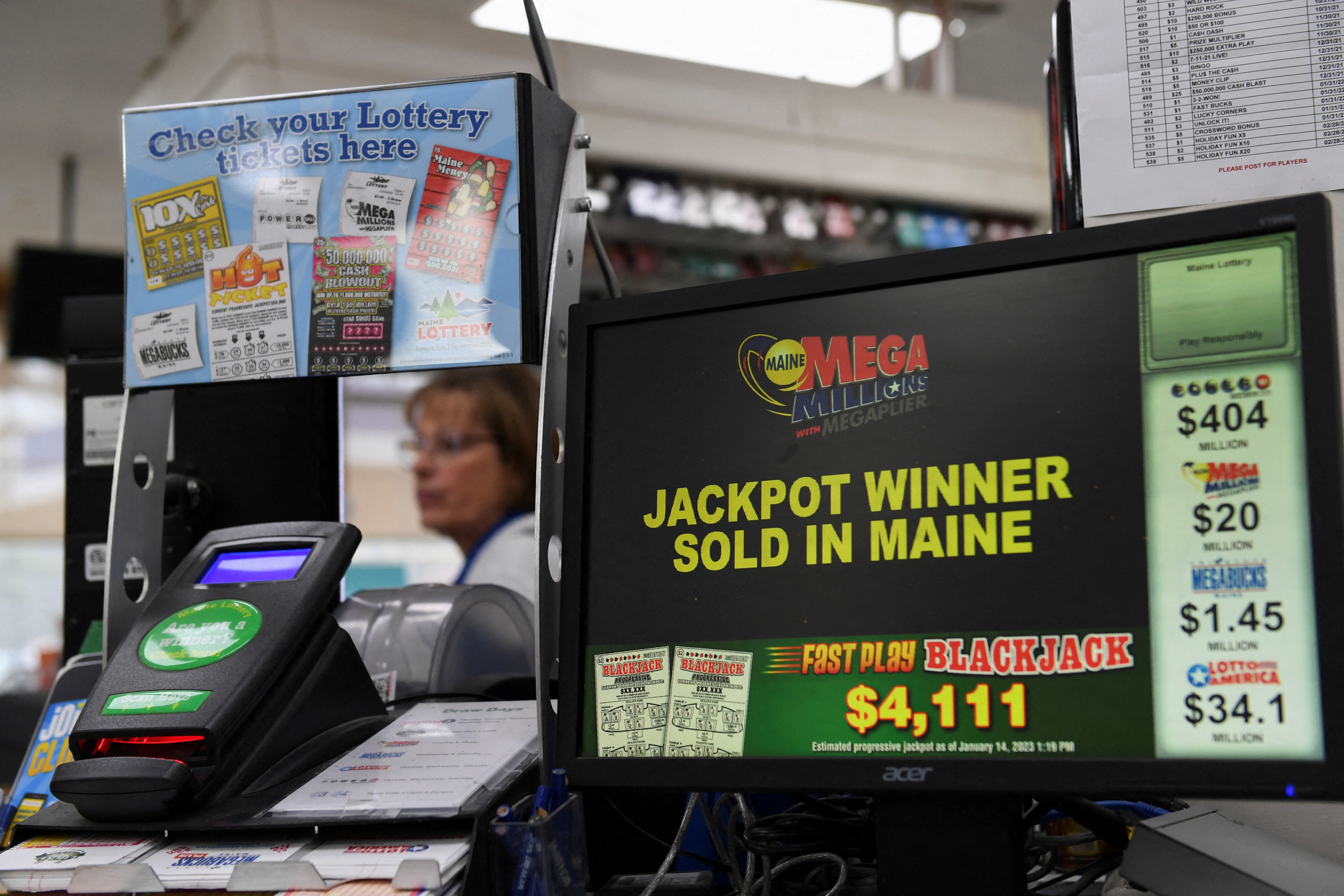A screen is seen at the Hometown Gas & Grill, where a single winning ticket for a Mega Millions lottery jackpot of at least $1.35 billion, the second largest jackpot in U.S. history, was sold, according to lottery organizers, in Lebanon, Maine, U.S. January 14, 2023. Photo: Reuters
