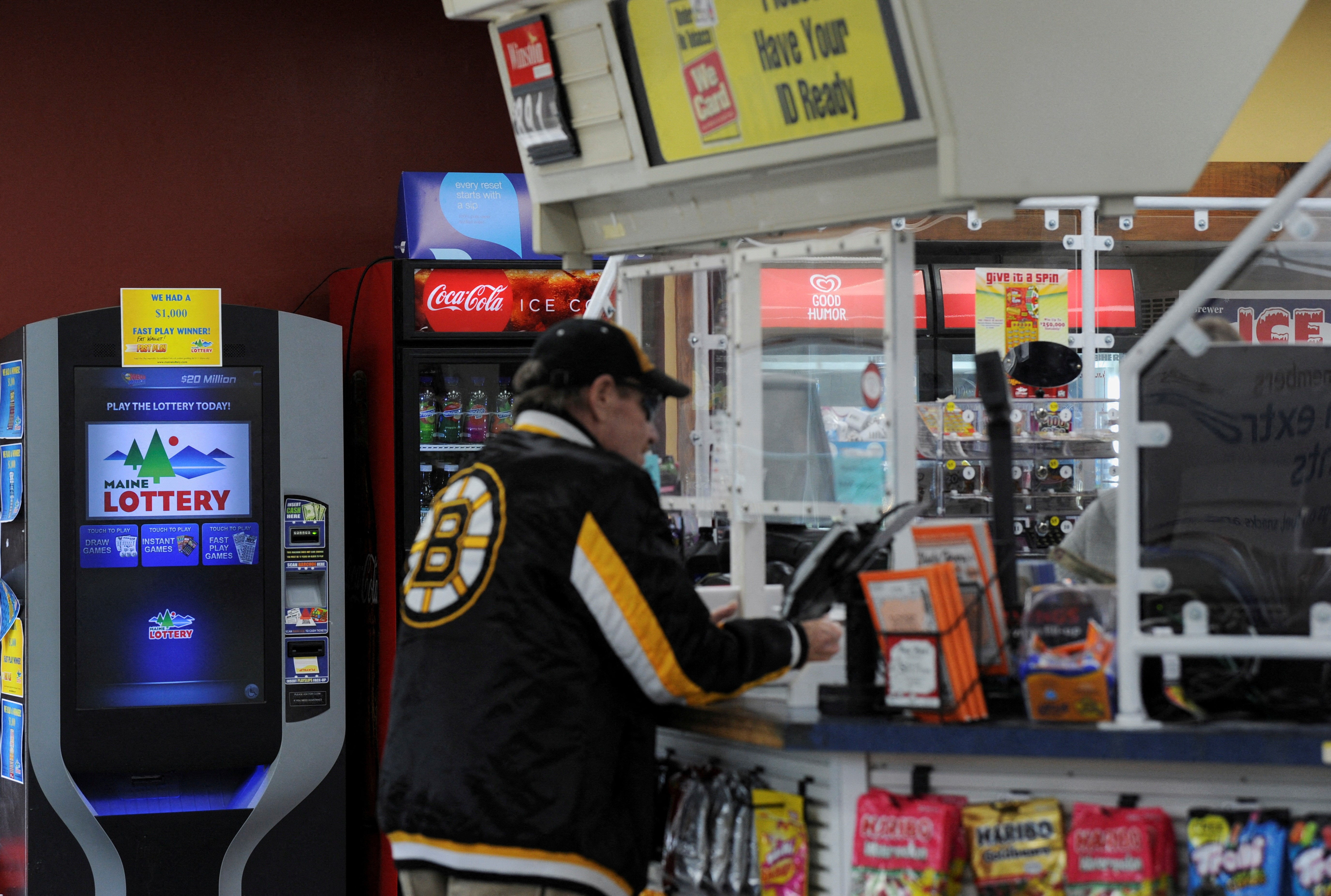 A customer shops at the Hometown Gas & Grill, where a single winning ticket for a Mega Millions lottery jackpot of at least $1.35 billion, the second largest jackpot in U.S. history, was sold, according to lottery organizers, in Lebanon, Maine, U.S. January 14, 2023. Photo: Reuters