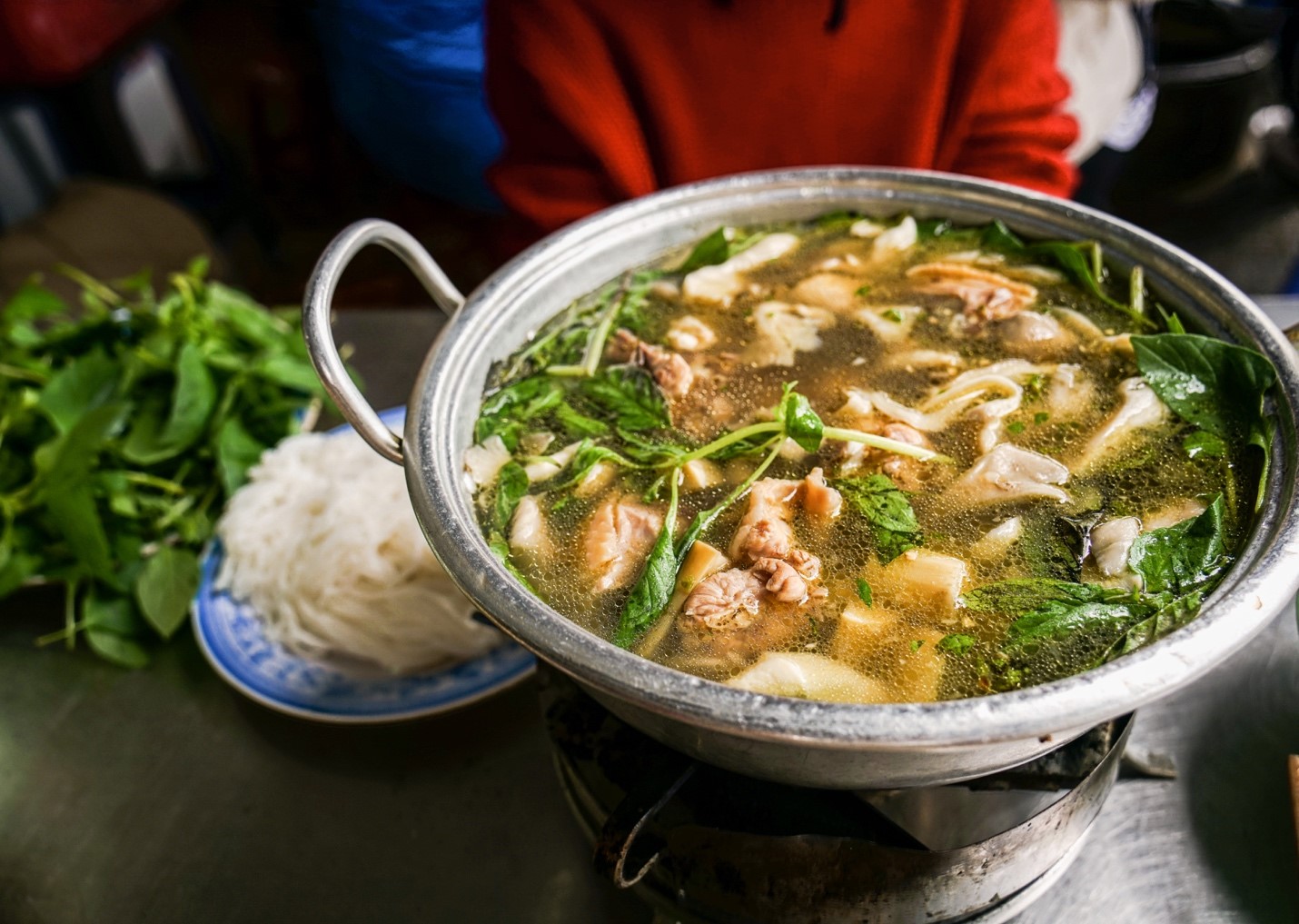 Chicken hotpot with lemon basil leaves. Photo: Nguyen Trung Au / Tuoi Tre News