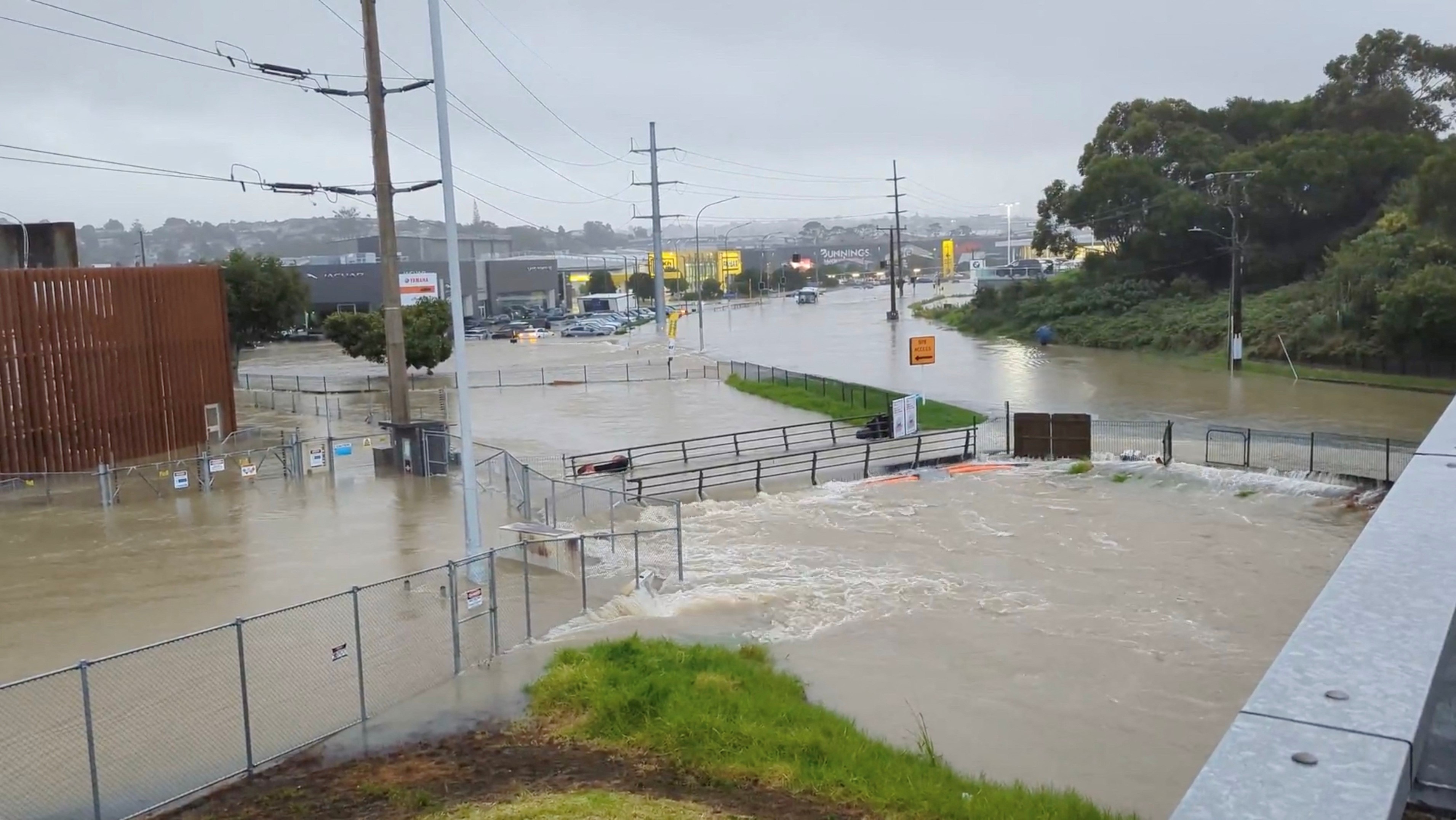 An area flooded during heavy rainfall is seen in Auckland, New Zealand January 27, 2023, in this screen grab obtained from a social media video. Photo: Reuters