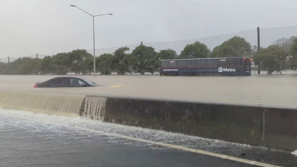 Stranded vehicles are seen during heavy rainfall in Auckland, New Zealand January 27, 2023, in this screen grab obtained from a social media video. Photo: @MonteChristoNZ/via REUTERS