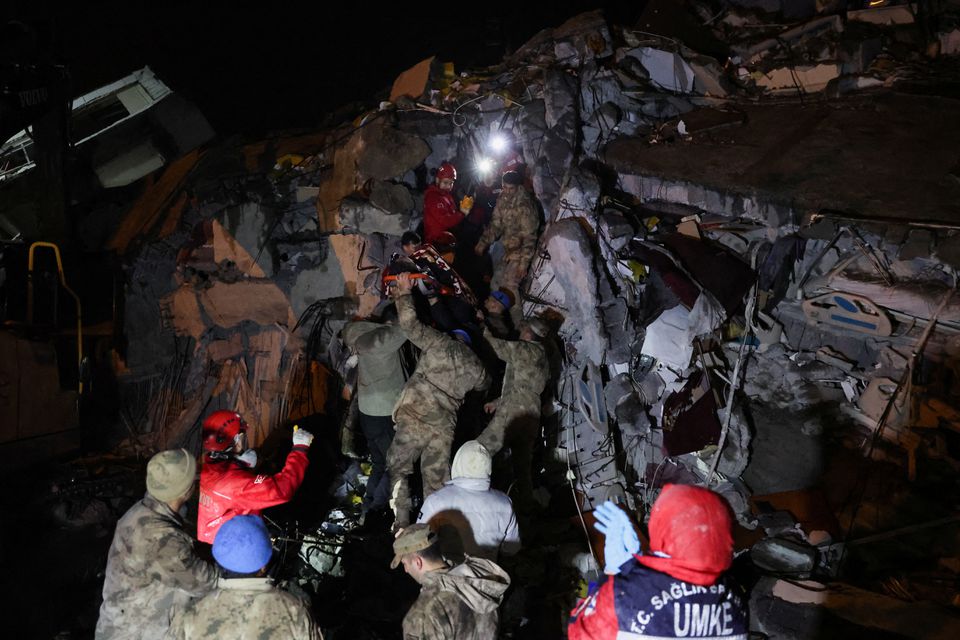 Cennet Sucu is rescued from the rubble of collapsed hospital, following an earthquake in Iskenderun, Turkey February 6, 2023. Photo: Reuters