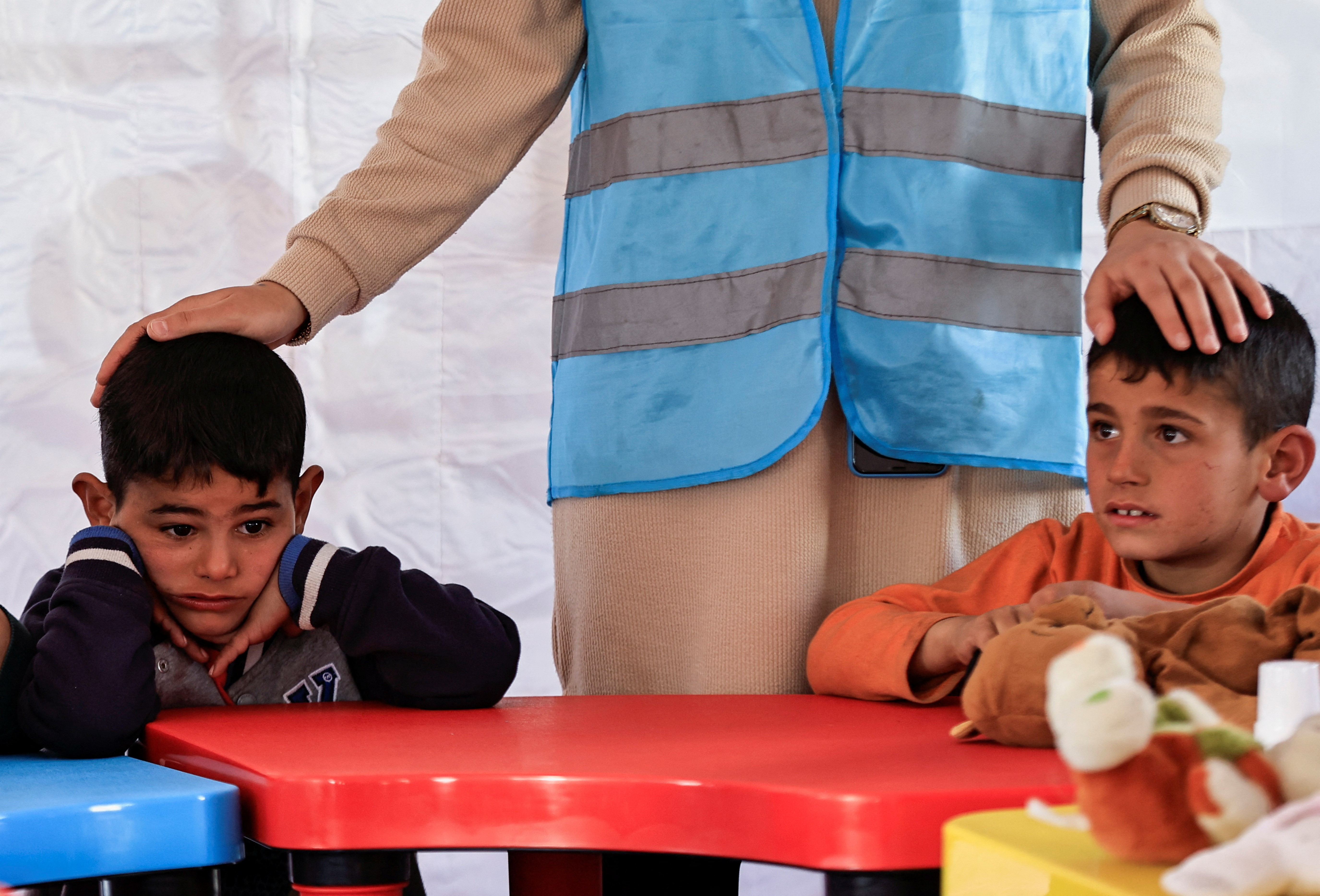 Children attend an activity to entertain and support the mental health of children affected by the deadly earthquake, at a camp for survivors, in Adiyaman, Turkey, February 18, 2023. Photo: Reuters