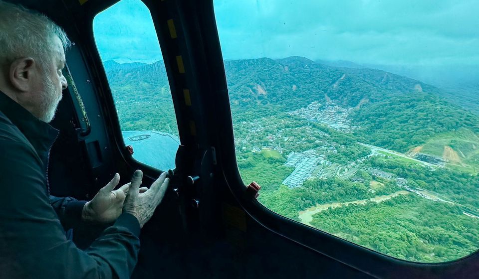 Brazil's President Luiz Inacio Lula da Silva flies in a helicopter over affected areas after torrential rain caused flooding and landslides in Sao Sebastiao, state of Sao Paulo, Brazil February 20, 2023. Ricardo Stuckert/Handout via Reuters