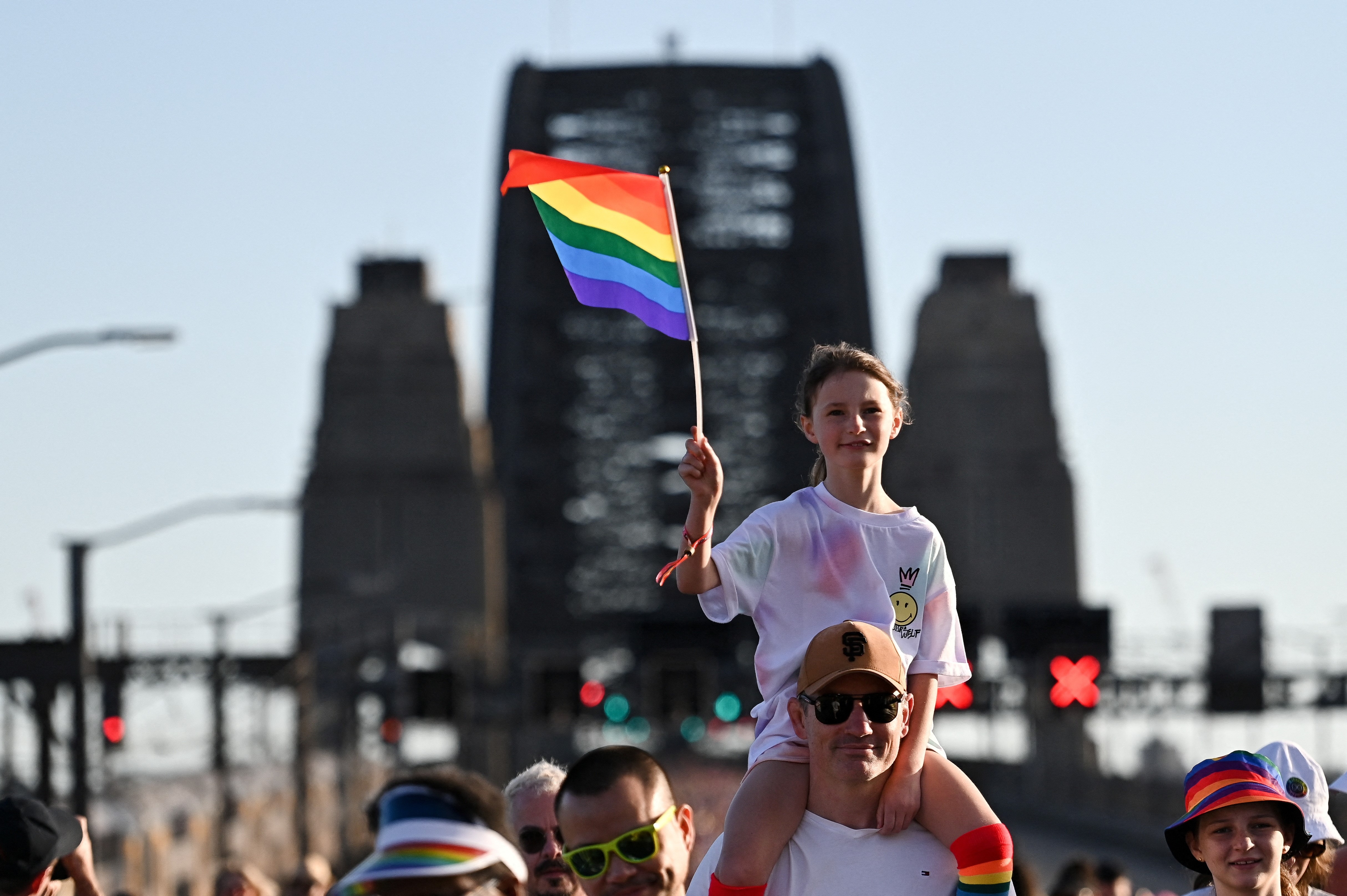 People march across the Sydney Harbour Bridge for equality as part of the 2023 WorldPride festival in Sydney, Australia, March 5, 2023. Photo: Reuters