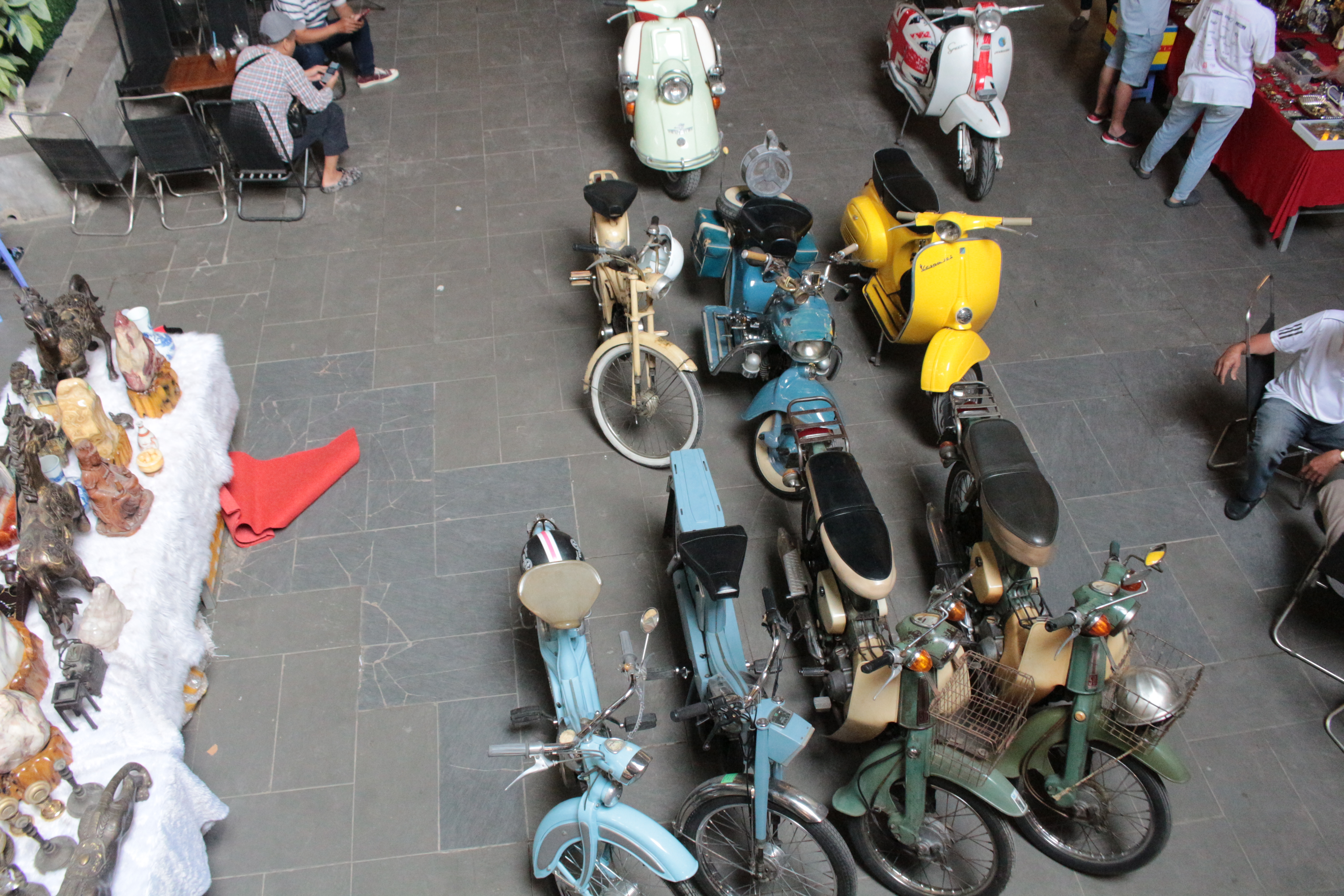 Old motorbikes are displayed at Cafe Chợ Đồ Cổ in Binh Thanh District, Ho Chi Minh City. Photo: Ray Kuschert
