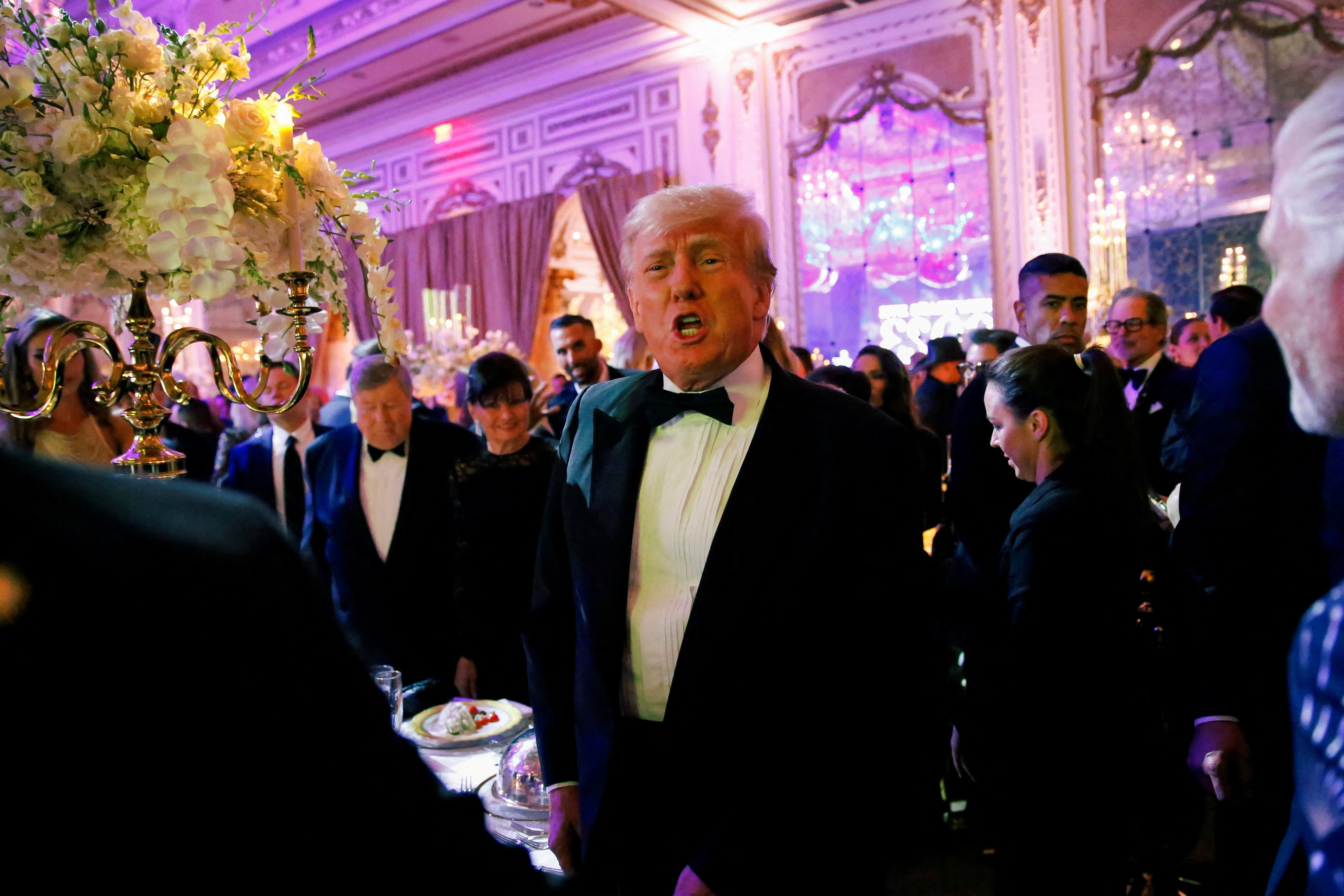 Former U.S. President Donald Trump, who announced a third run for the presidency in 2024, hosts a New Year's Eve party at his Mar-a-Lago resort in Palm Beach, Florida, U.S. December 31, 2022. Photo: Reuters