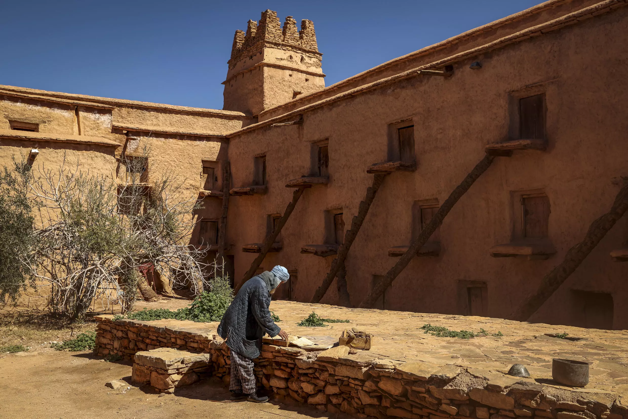 The granary, built using a practice known as rammed earth, sits in the village centre, protected by a fortified wall with a stone watchtower. Photo: AFP
