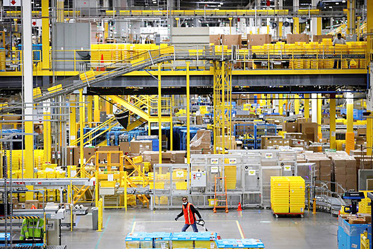 An Amazon warehouse is shown.. The e-commerce giant is among the U.S. enterprises coming to Vietnam this week. Photo: Reuters
