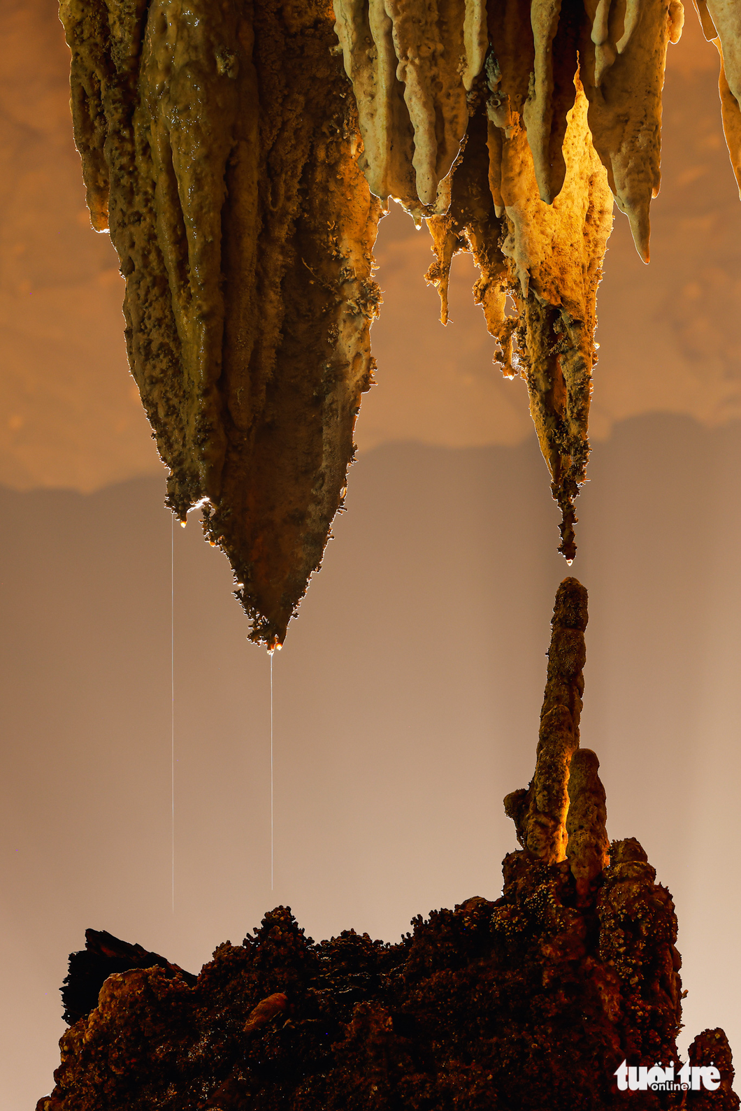 One precious moment of two drops of water falling concurrently from the cave ceiling, forming breathtakingly beautiful stalactites over millions of years. Photo: Ngo Tran Hai An